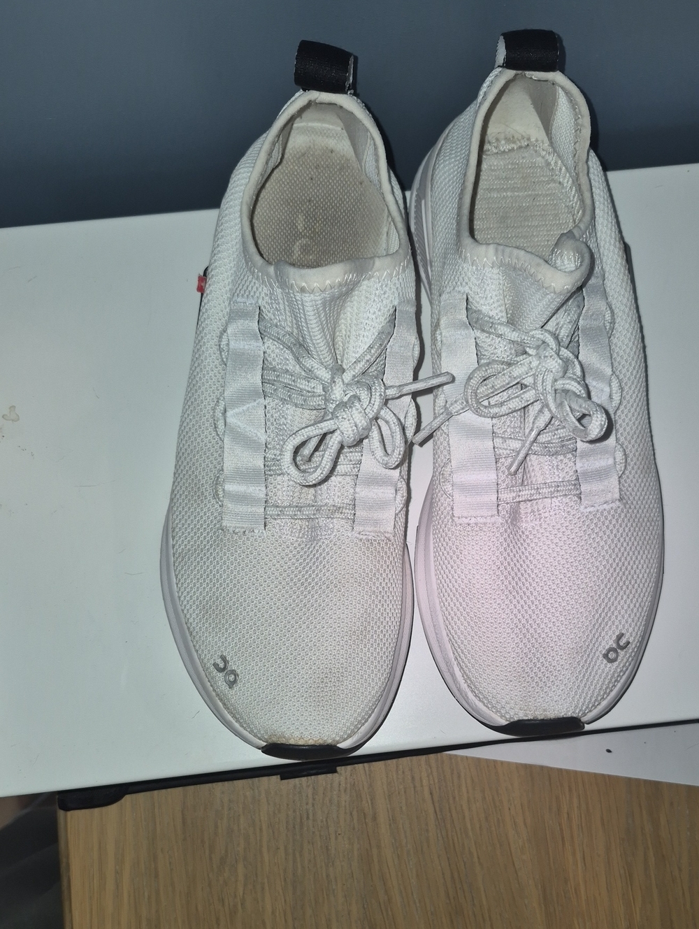 On Running White Women's Athletic Sneakers with Black Heel Tabs